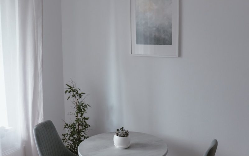 a white table and chairs in a room