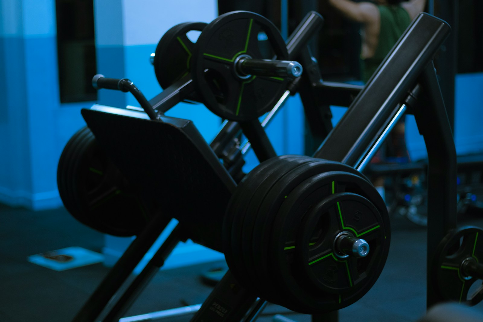 a man is in the gym with a barbell